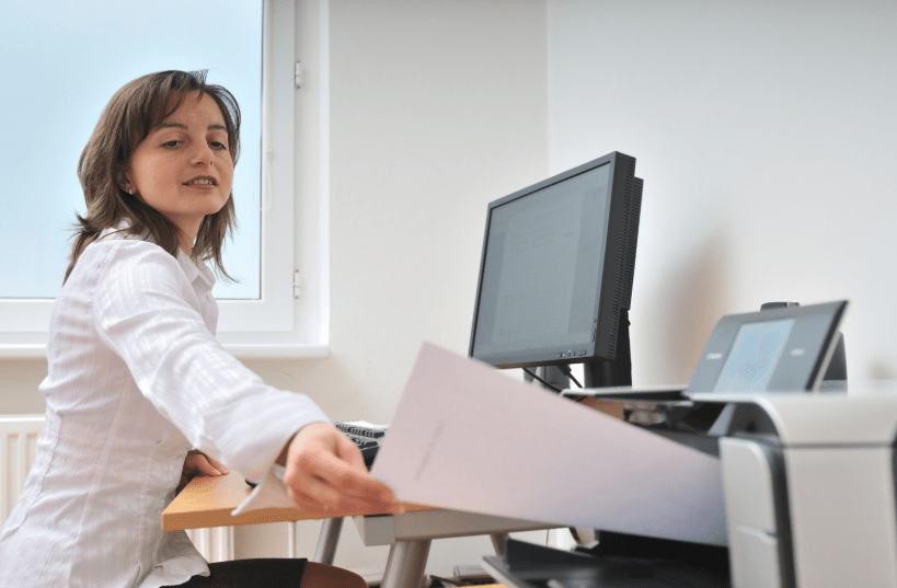 Woman at home office printer