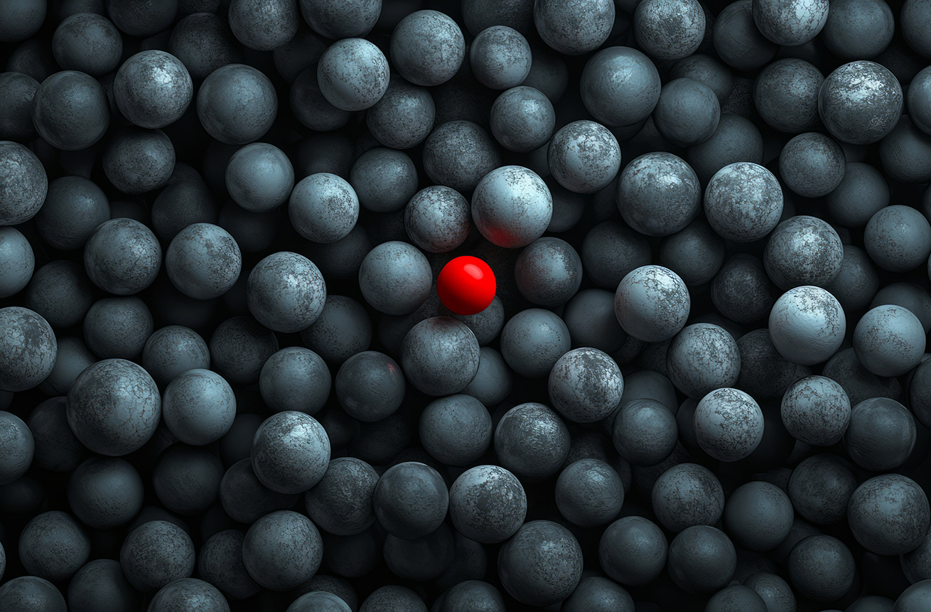 A red figure stands out from the crowd of gray spheres, symbolizing individuality and standing out in an international company. The concept conveys diversity among employees or emphasizing personal brand and creating identity within team dynamics. This visual metaphor is used to convey more than one message about human resources at your scientific research agency. --ar 53:30 --v 6.1 Job ID: 12f9e450-1c27-4581-9784-1f5595db0c5a