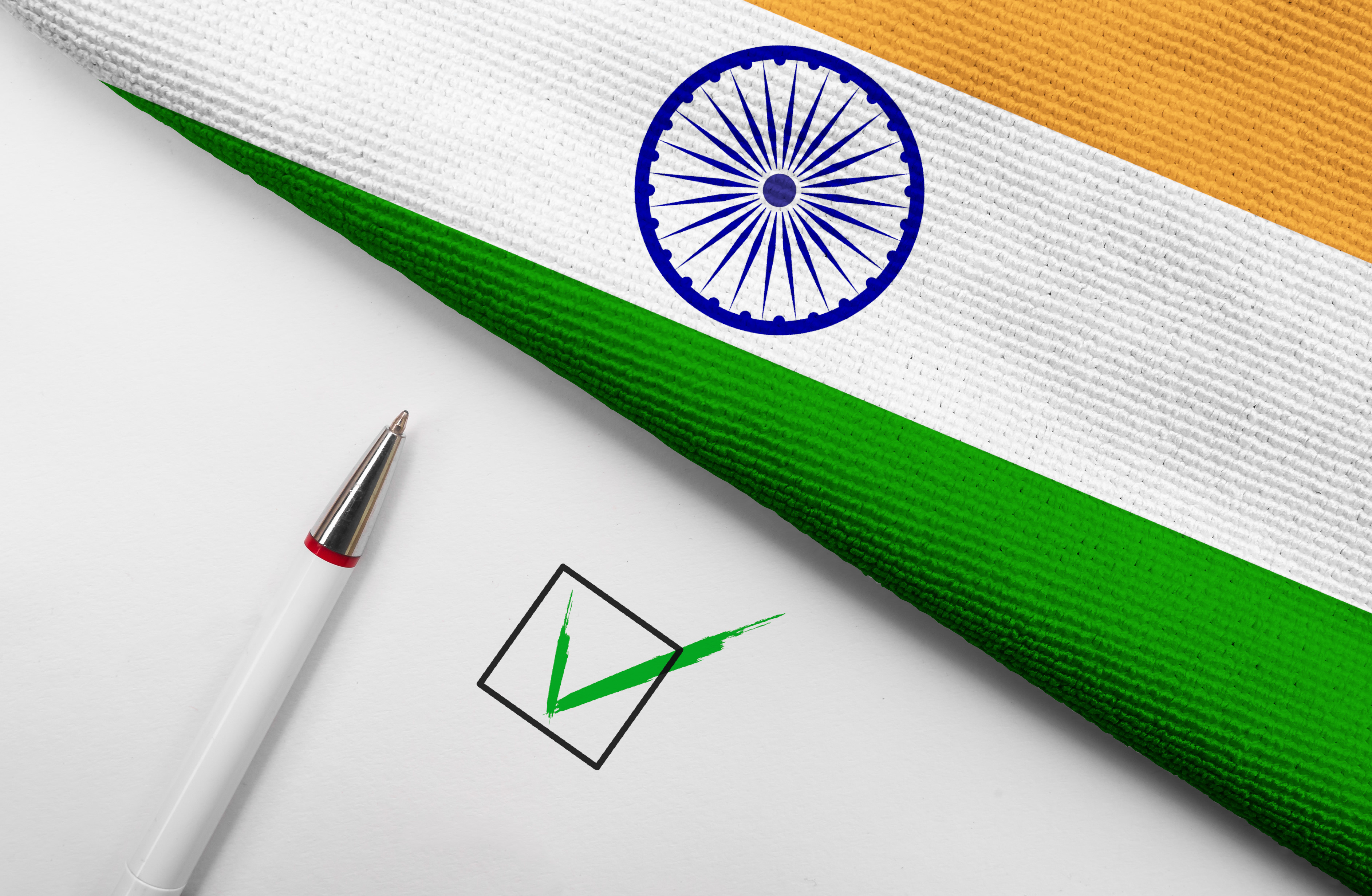 Pencil, Flag of India and check mark on paper sheet