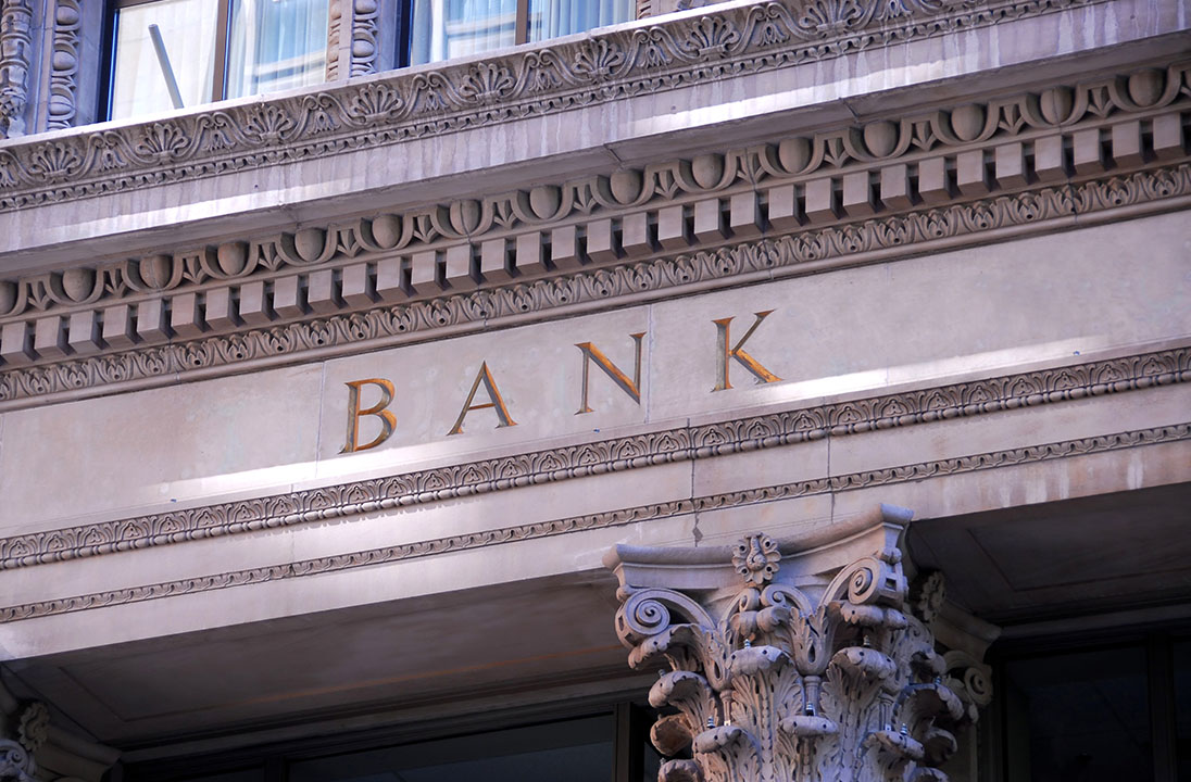 Old building with letters bank on it